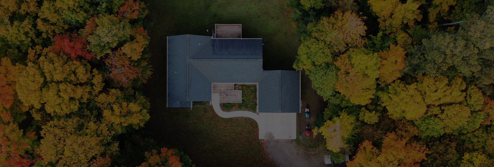 Birdseye view of a house's roof after having it's roof replaced by McCoy Roofing.