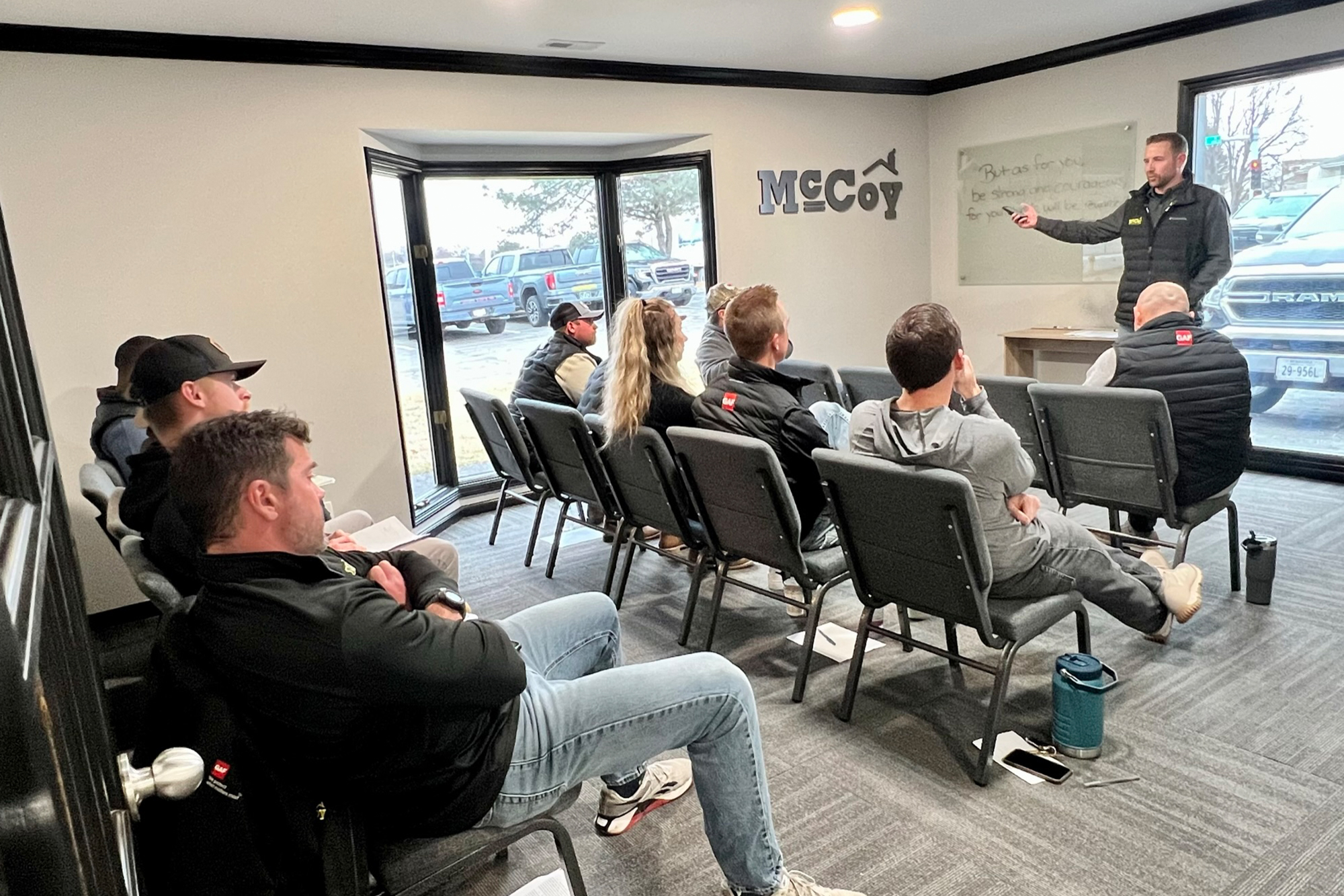 The McCoy Roofing Team listening to Lee McCoy, Co-Owner, share what's next for the roofing contractor team.
