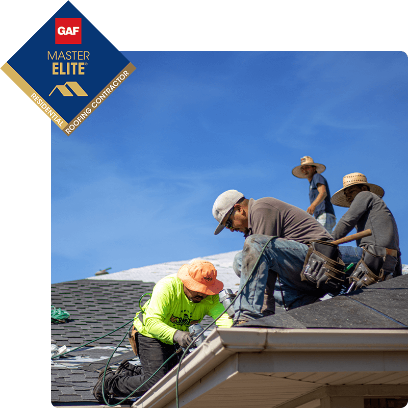 McCoy Roofing Sioux Falls roofing contractors working on a roof are GAF Master Elite, roofing contractors.