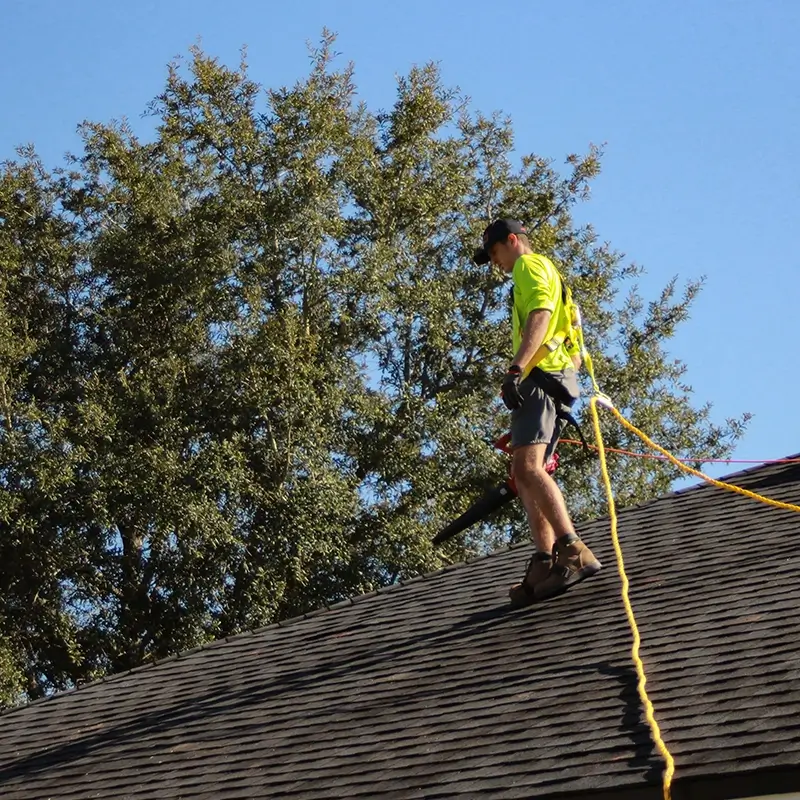 McCoy Roofing inspects the quality of the roof material on a home, determining if it needs a roof replacement or a roof repair.